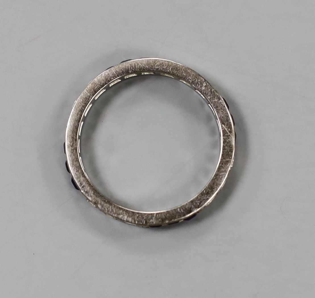 A white metal, square cut sapphire and round cut diamond set full eternity ring, size Q, gross weight 3.8 grams.